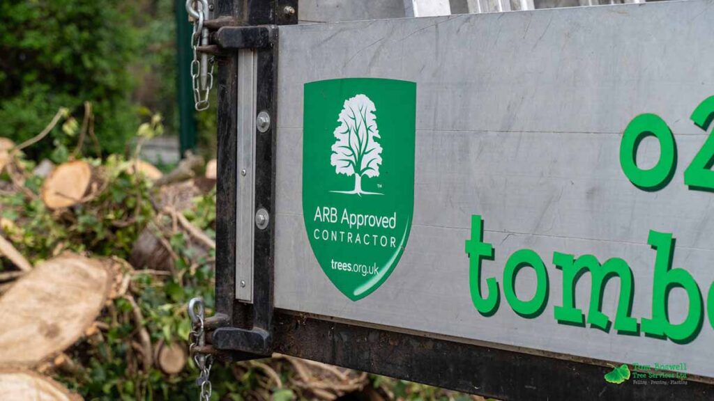 The Arab approved contractor logo on the rear tail of Tom Boswell tree's van
